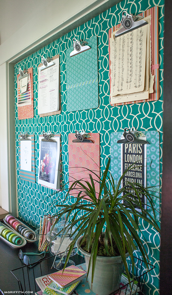 styled clipboards on teal background