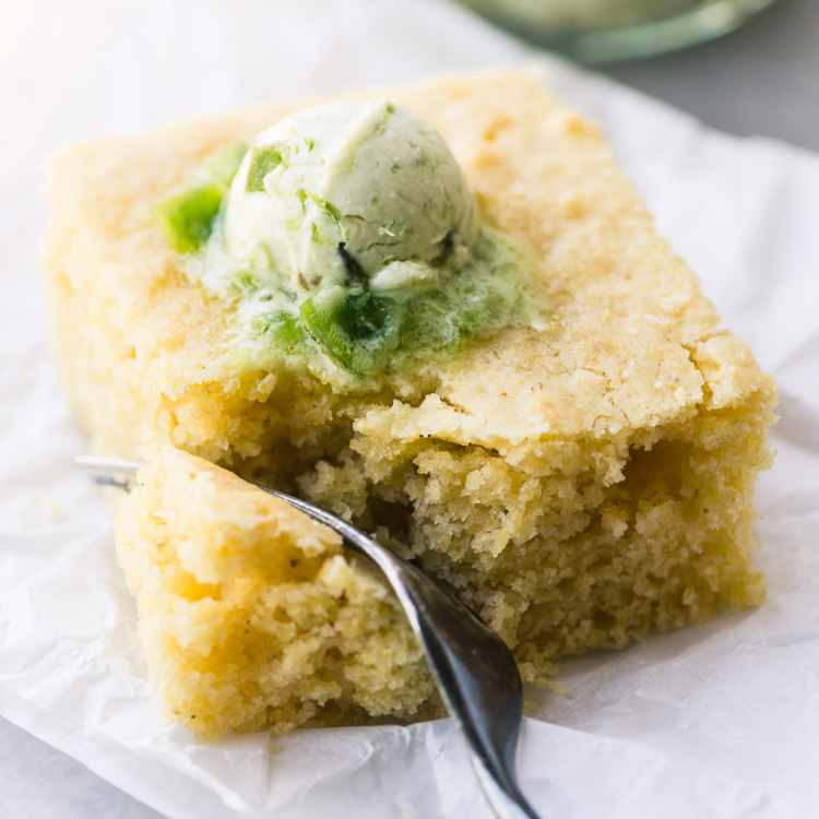 Close up of cornbread with jalapeno butter.